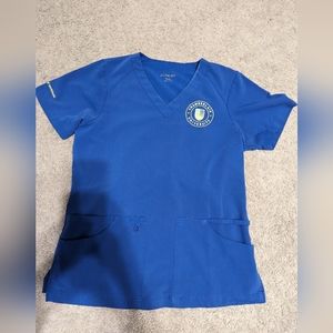 Chamberlain University unisex scrub top. Cobalt. Size small.